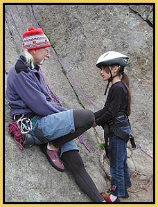 You are never too old or too young to climb. Climbing Guide Frank (52) and Tenaya (9) discuss some of the finer aspects of climbing Devils Tower with a climbing guide at Devils Tower National Monument.